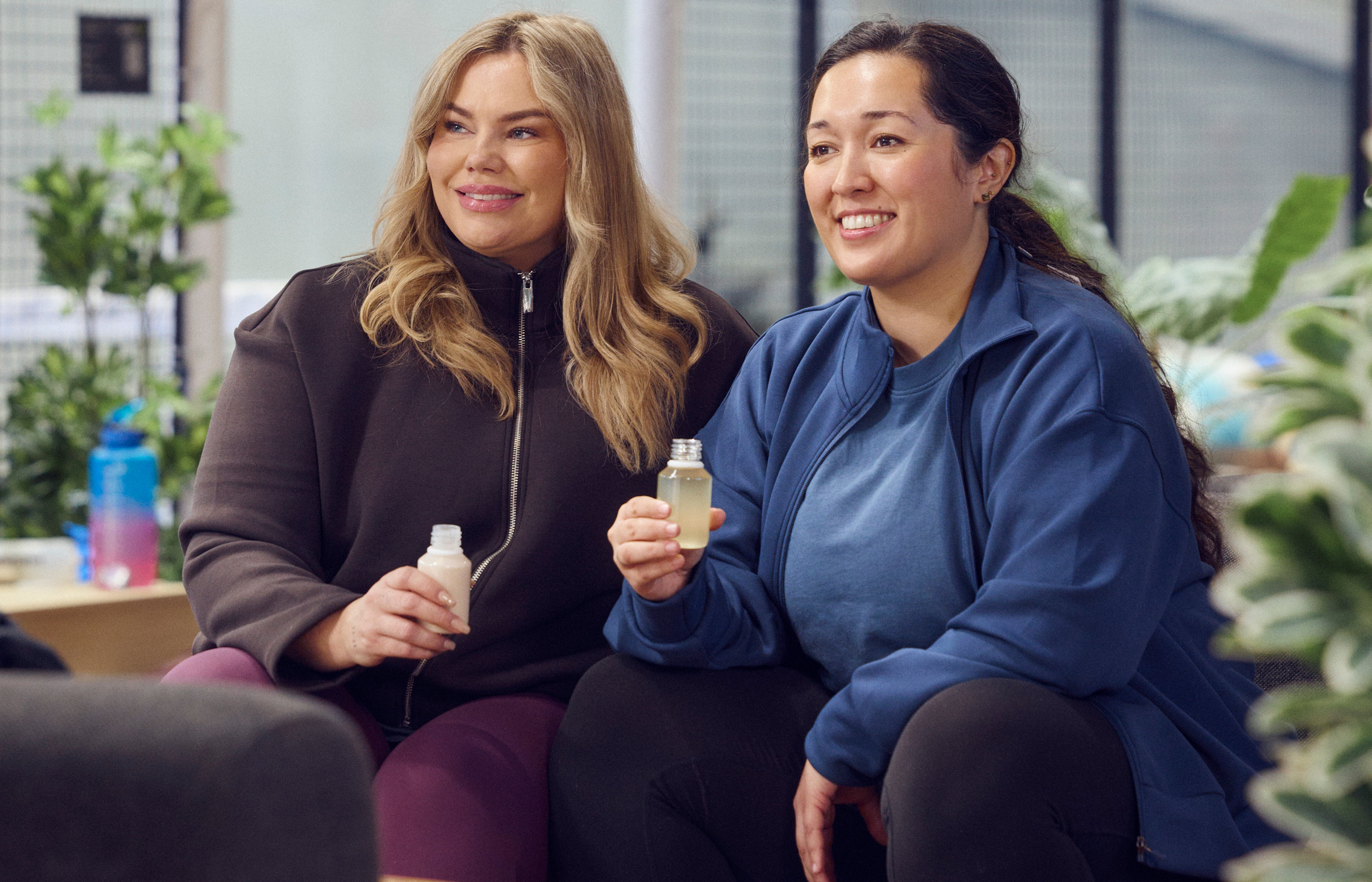 two persons drinking a glp 1 drink 