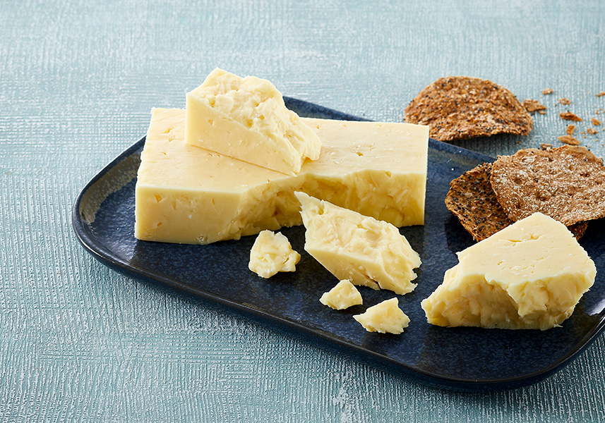 Queso Cheddar bajo en grasa y naturalmente cremoso